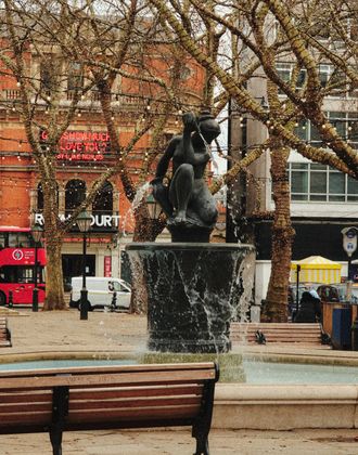Sloane Square fountain with festive lights