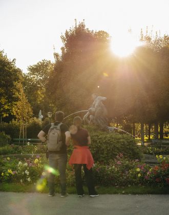 Couple standing in the Volksgarten Park in the first district in Vienna